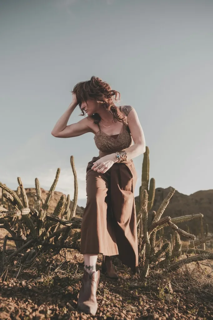 Rust knit top styled in high desert scrub