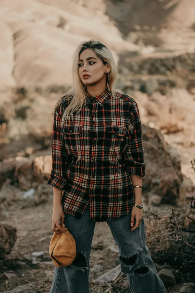 Oversized plaid flannel with distressed denim in the desert