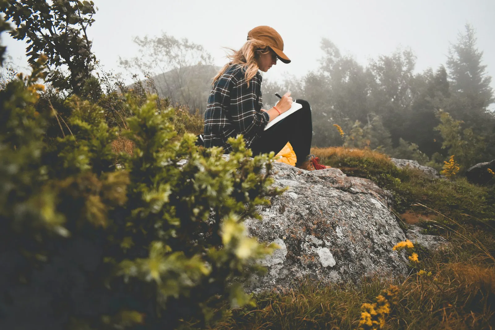 Plaid flannel worn on a foggy ridge